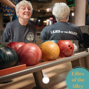 Carol Barnes sporting her Lilies of the Alley shirt